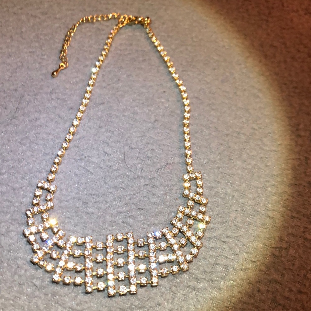 Very pretty necklace- silver look with crystals or rhinestones.